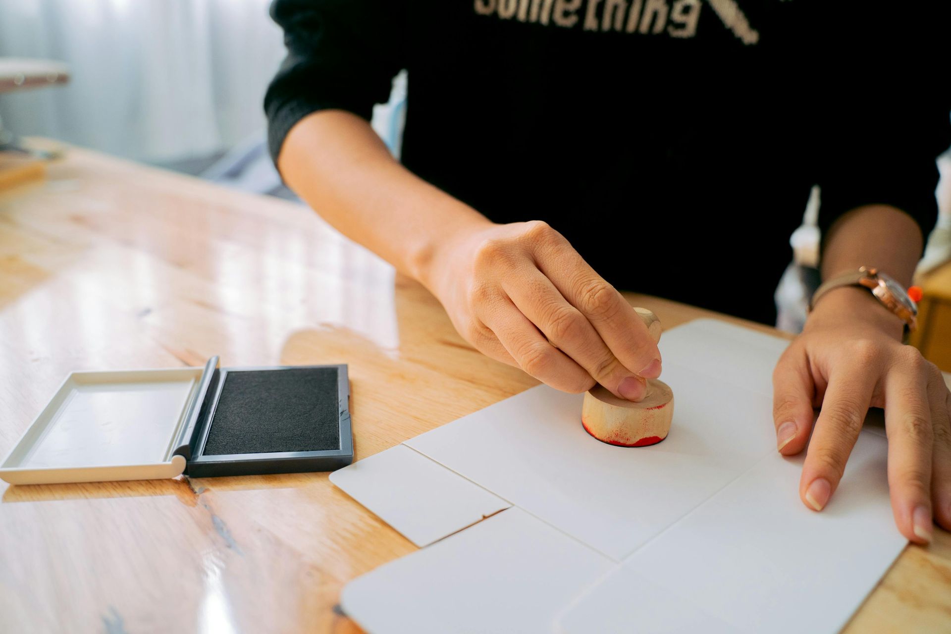 Notary professional stamping official documents for certification