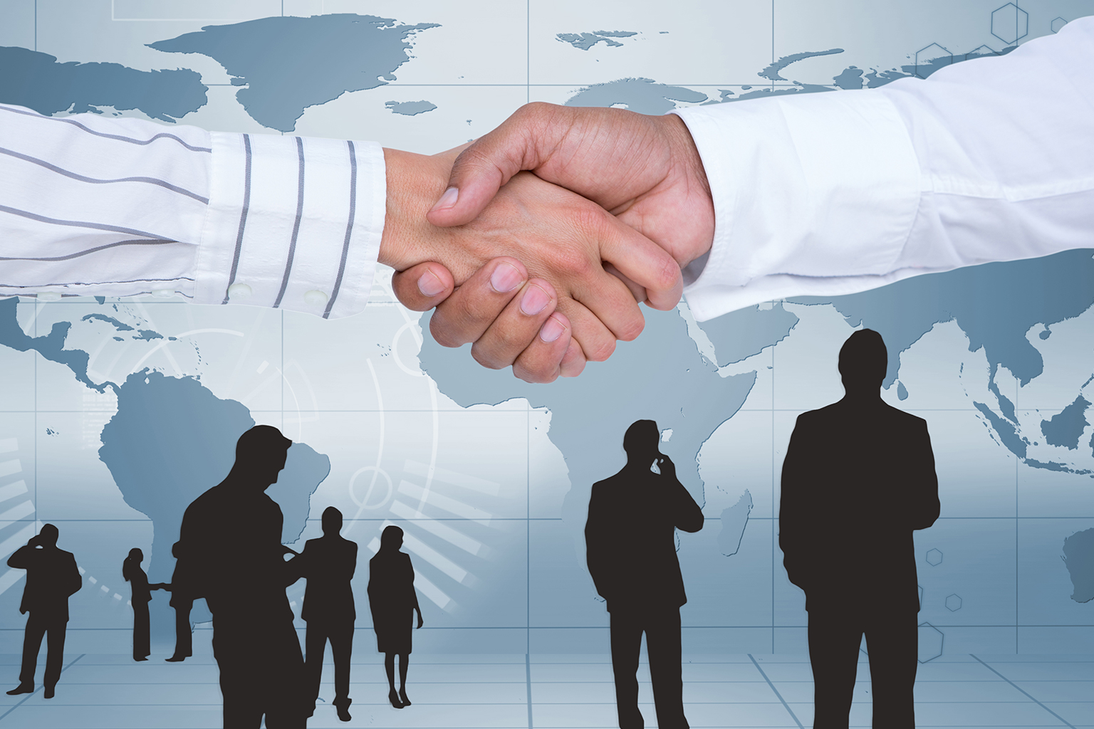 Business professionals shaking hands for international franchise partnerships